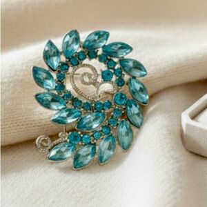 Aqua Blue & Silver Rhinestone Spiral Swirl Brooch